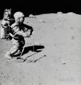 Duke Charles John Young Collecting Lunar Samples With The Rover Parked In The Background, Station 11, Eva 3, Apollo 16 Duke Charles John Young Collecting Lunar Samples With The Rover Parked In The Background, Station 11, Eva 3, Apollo 16