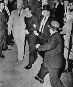 BEERS Jack 1910-2009,Ruby steps out of crowd, thrusts gun at Oswald.,1963,Swann Galleries 2010-12-09