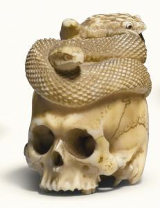 SCUOLA GIAPPONESE,OKIMONO OF A SKULL WITH A COILED SNAKE AND A FROG,Sotheby's GB 2017-07-06