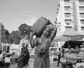 THOMPSON Gabriel Palmer 1981,Carrying oil, Yangon, Myanmar,2013,Bonhams GB 2015-09-14