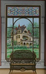 WALL Sue 1950,Wicker Chair with Queen Anne style house in the Distance,Rachel Davis US 2019-05-18