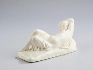 ZSOLNAY PECS,A recumbent female figure,1900,Palais Dorotheum AT 2023-11-03